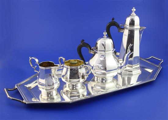 A matched George V 18th century design silver five piece tea set, gross 94 oz.